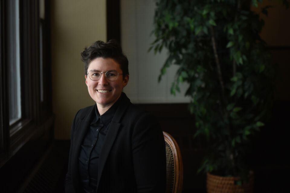 Professional portrait of Attorney Julie Dick seated in chair.